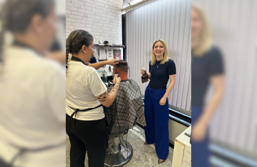 Photo of Julia at a local hairdressers.