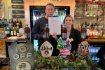 Julia Lopez MP presents Greg Mangham with his Points of Light Award at The Windmill Pub, Upminster
