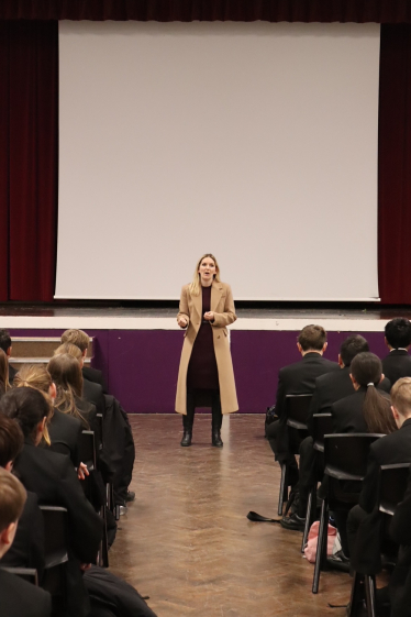 Julia Lopez MP addressing pupils at Sanders Draper Academy